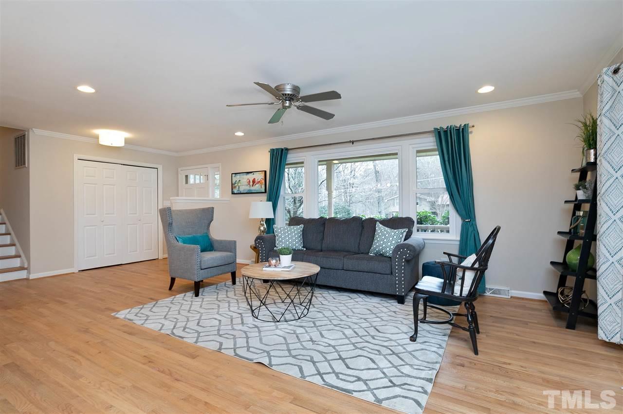 6509 Wrenwood Avenue Raleigh, NC 27607 - Photo 3 of 29 a living room with furniture and a large window