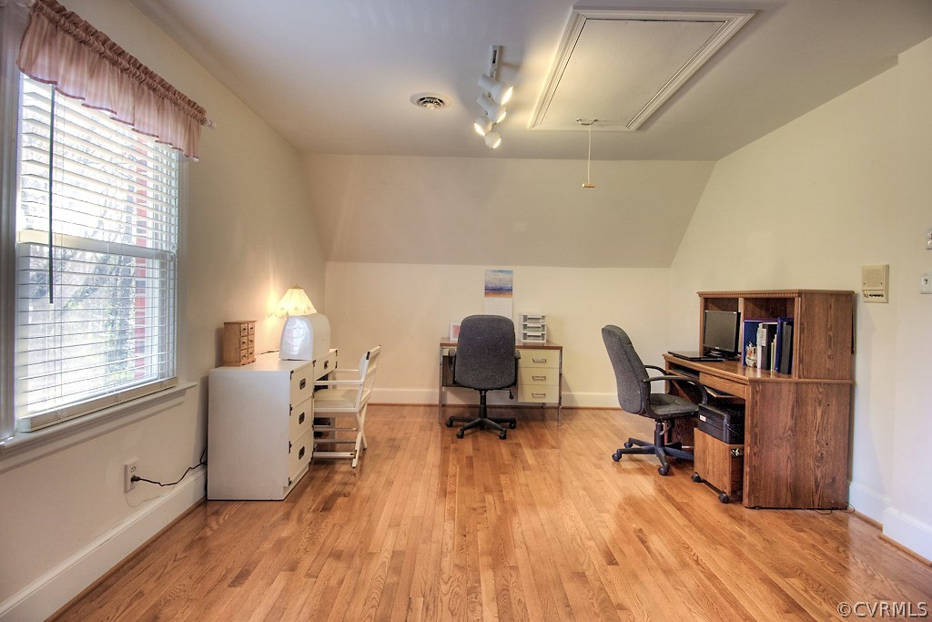 570 Fords Road Manakin-Sabot, VA 23103 - Photo 32 of 50 a view of a workspace with furniture and a window