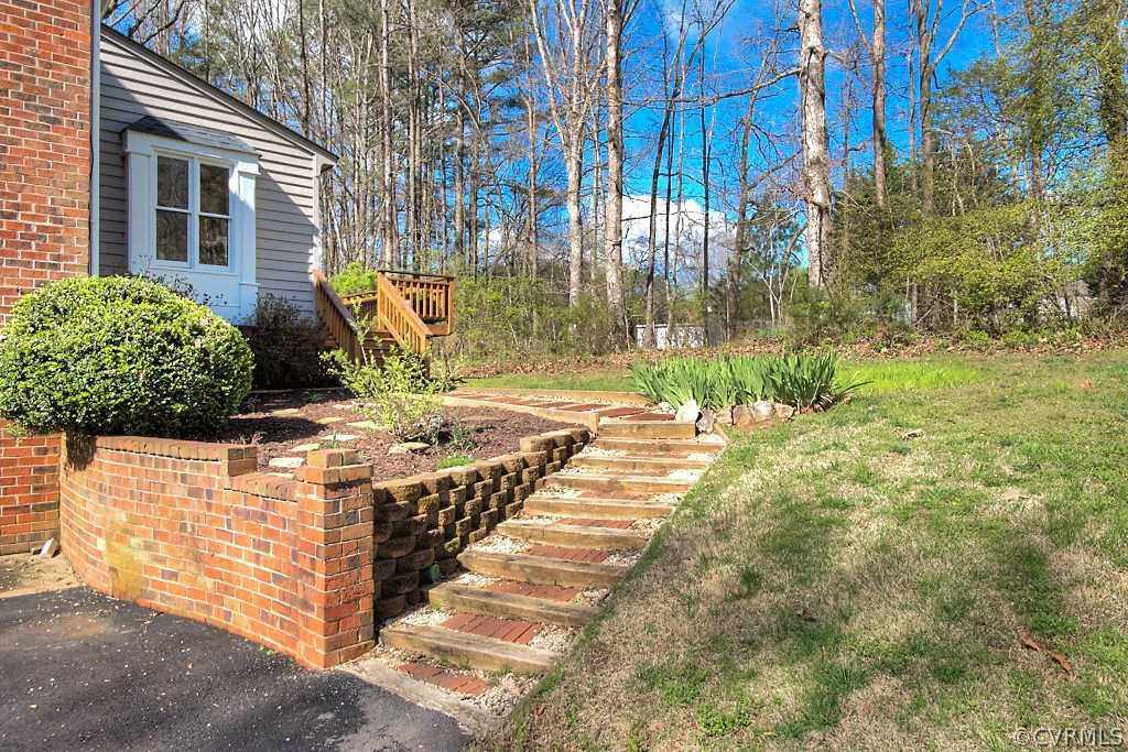 570 Fords Road Manakin-Sabot, VA 23103 - Photo 42 of 50 a view of a pathway with a wrought fence