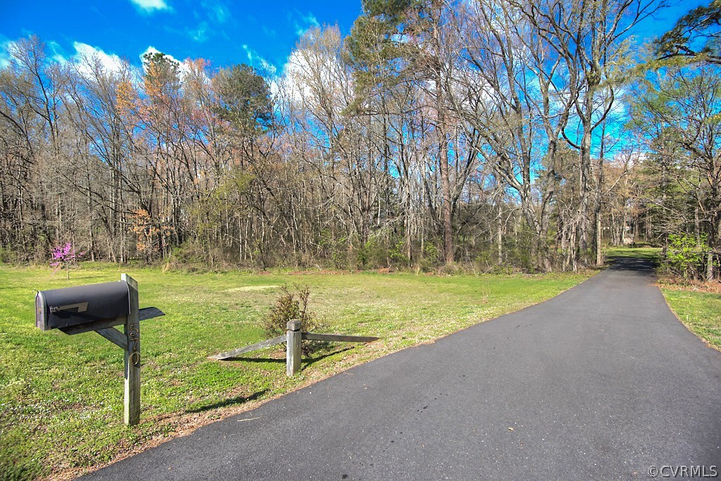 570 Fords Road Manakin-Sabot, VA 23103 - Photo 50 of 50 a view of a yard with large trees