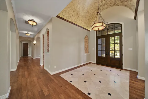 a large spacious bathroom with a large tub and sink