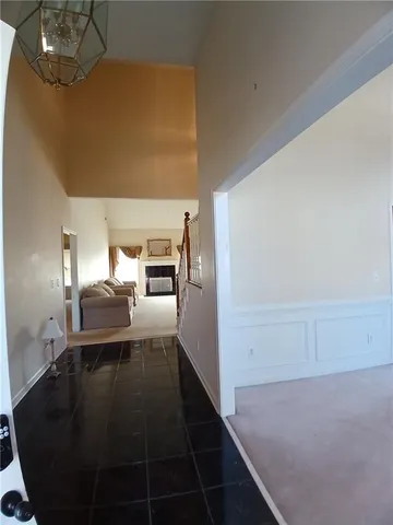 a kitchen with stainless steel appliances a refrigerator sink and cabinets