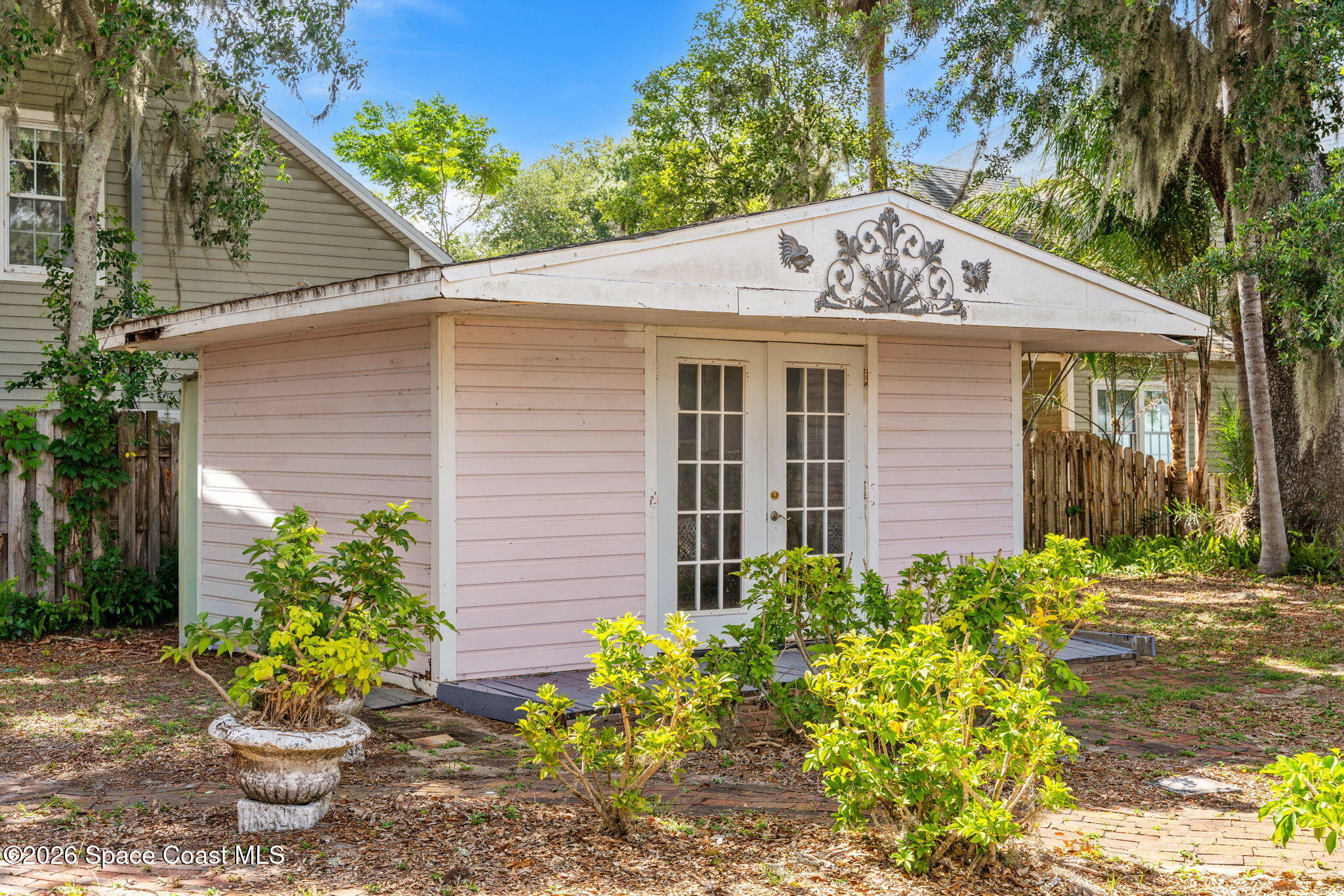 1101 Rockledge Drive Rockledge, FL 32955 - Photo 64 of 76 a front view of a house with a yard