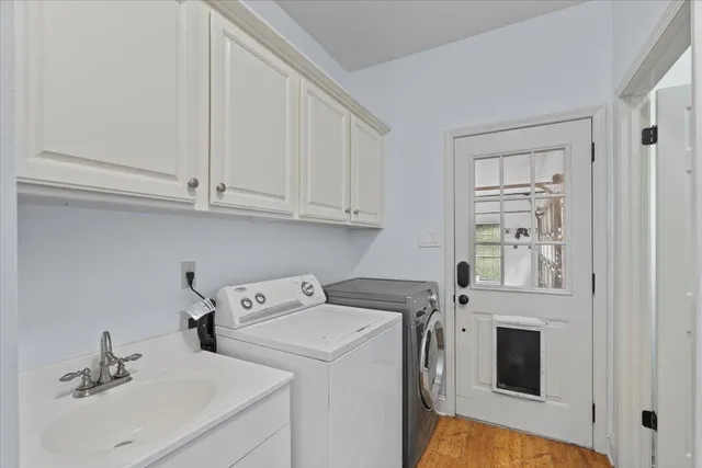 a utility room with dryer and washer
