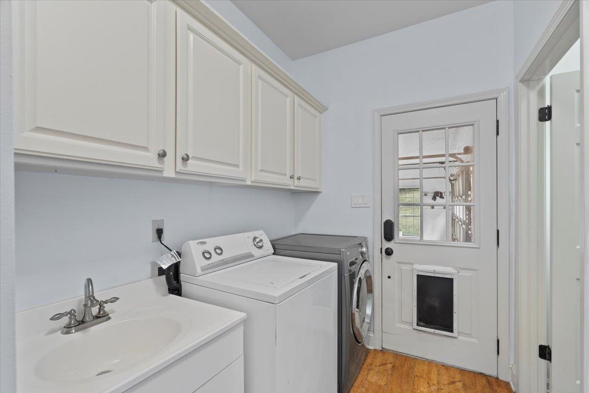 8485 Highway 196 Collierville, TN 38017 - Photo 17 of 34 a utility room with dryer and washer