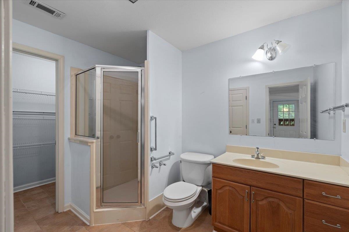 8485 Highway 196 Collierville, TN 38017 - Photo 20 of 34 a bathroom with a toilet sink and shower