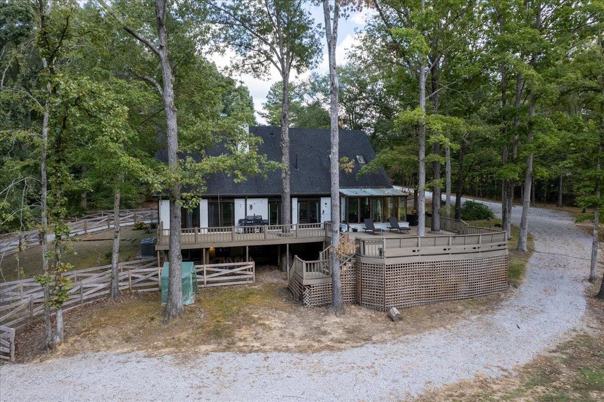 8485 Highway 196 Collierville, TN 38017 - Photo 24 of 34 a view of house with a swimming pool and sitting area