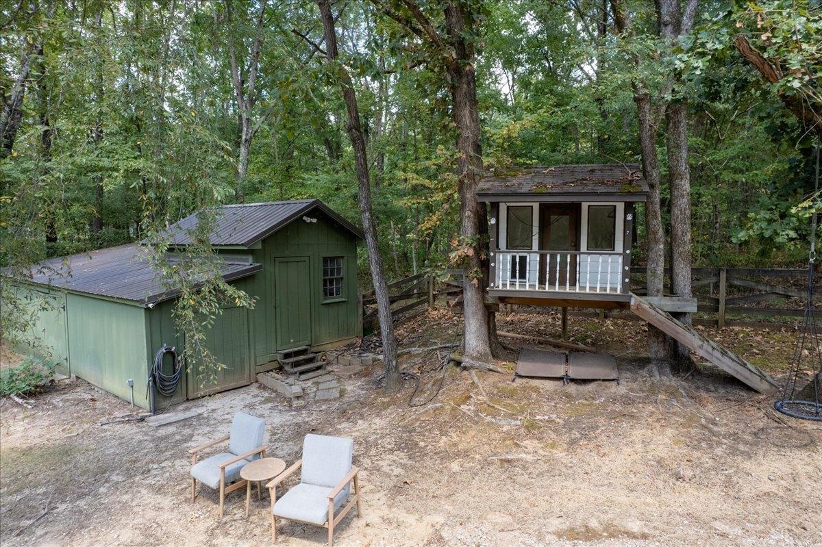 8485 Highway 196 Collierville, TN 38017 - Photo 25 of 34 front view of a house with a yard