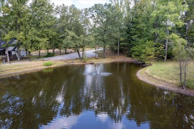 a view of a lake with a house
