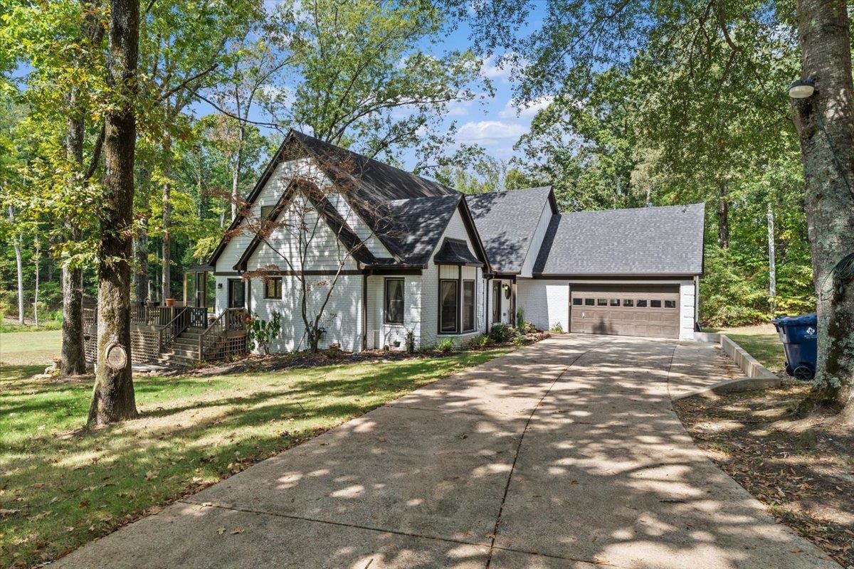 8485 Highway 196 Collierville, TN 38017 - Photo 34 of 34 a view of a house with a yard