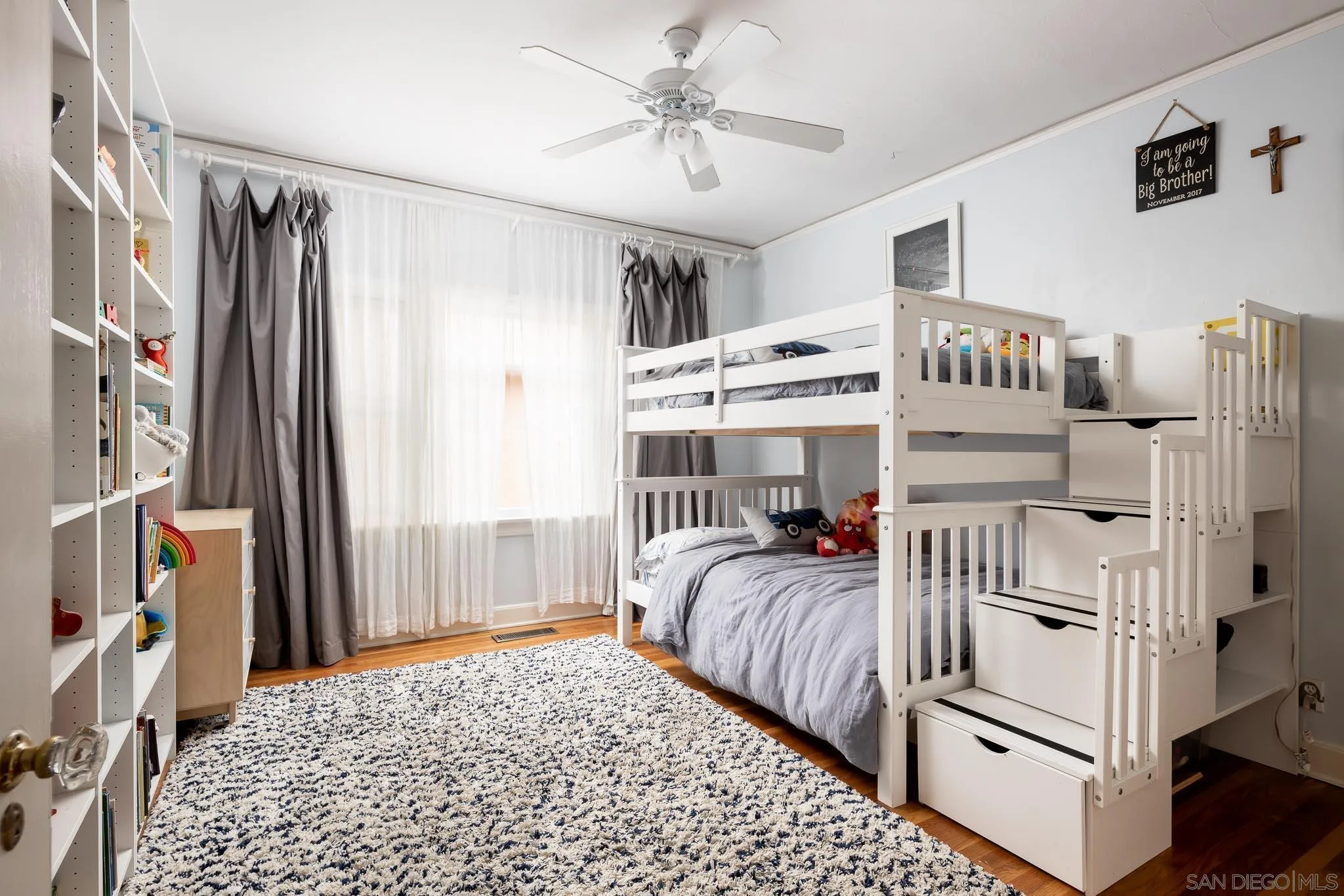4192 Rochester Road San Diego, CA 92116 - Photo 20 of 49 a bedroom with furniture and a walk in closet
