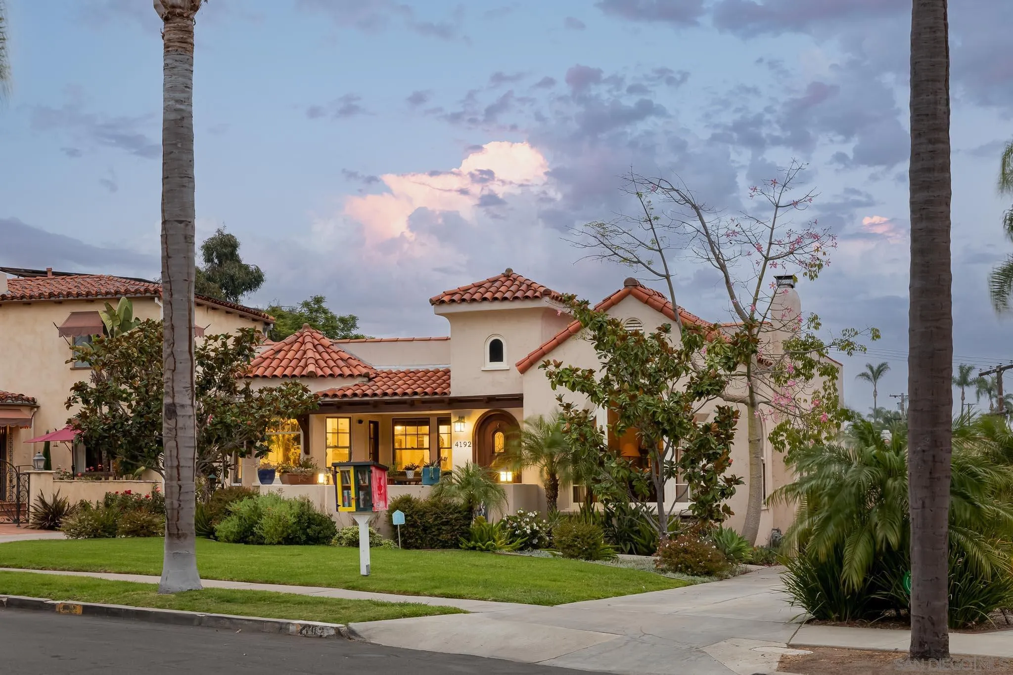 4192 Rochester Road San Diego, CA 92116 - Photo 2 of 49 a view of a building with a yard