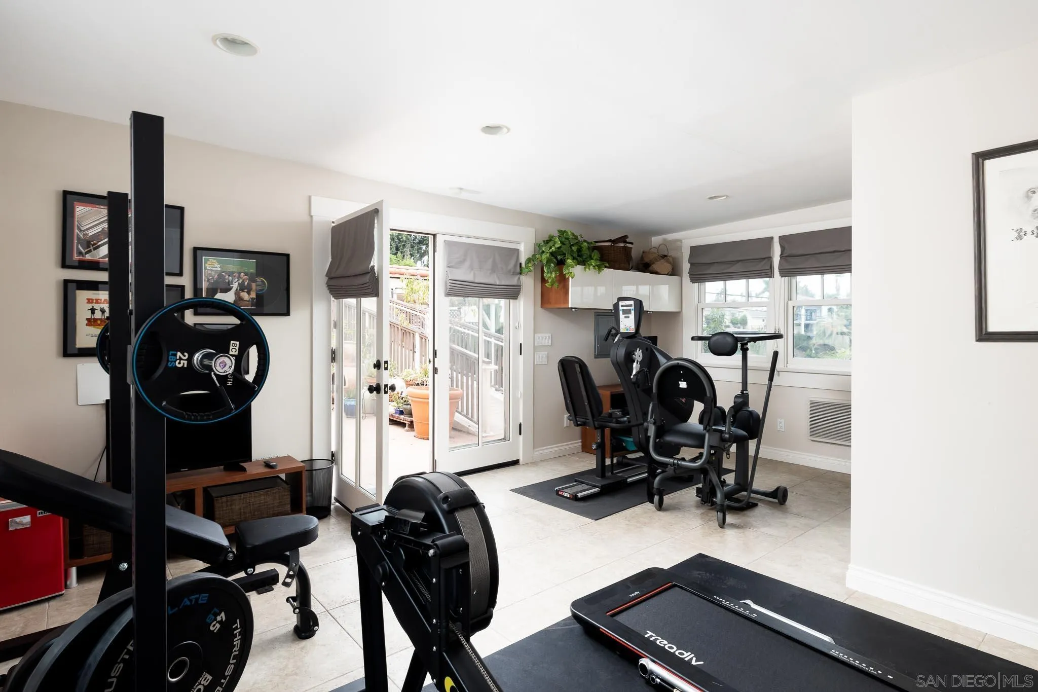 4192 Rochester Road San Diego, CA 92116 - Photo 29 of 49 a view of a workspace with furniture and a window