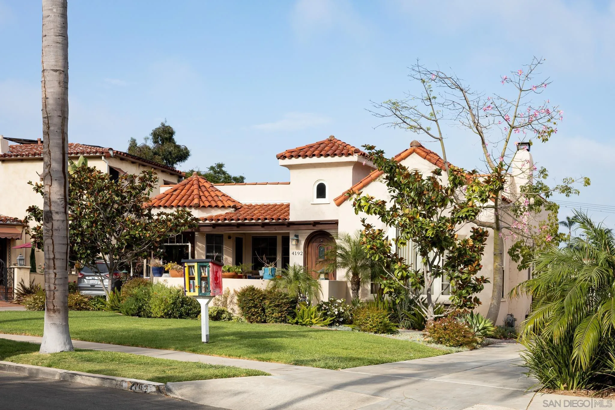 4192 Rochester Road San Diego, CA 92116 - Photo 49 of 49 a front view of a house with garden