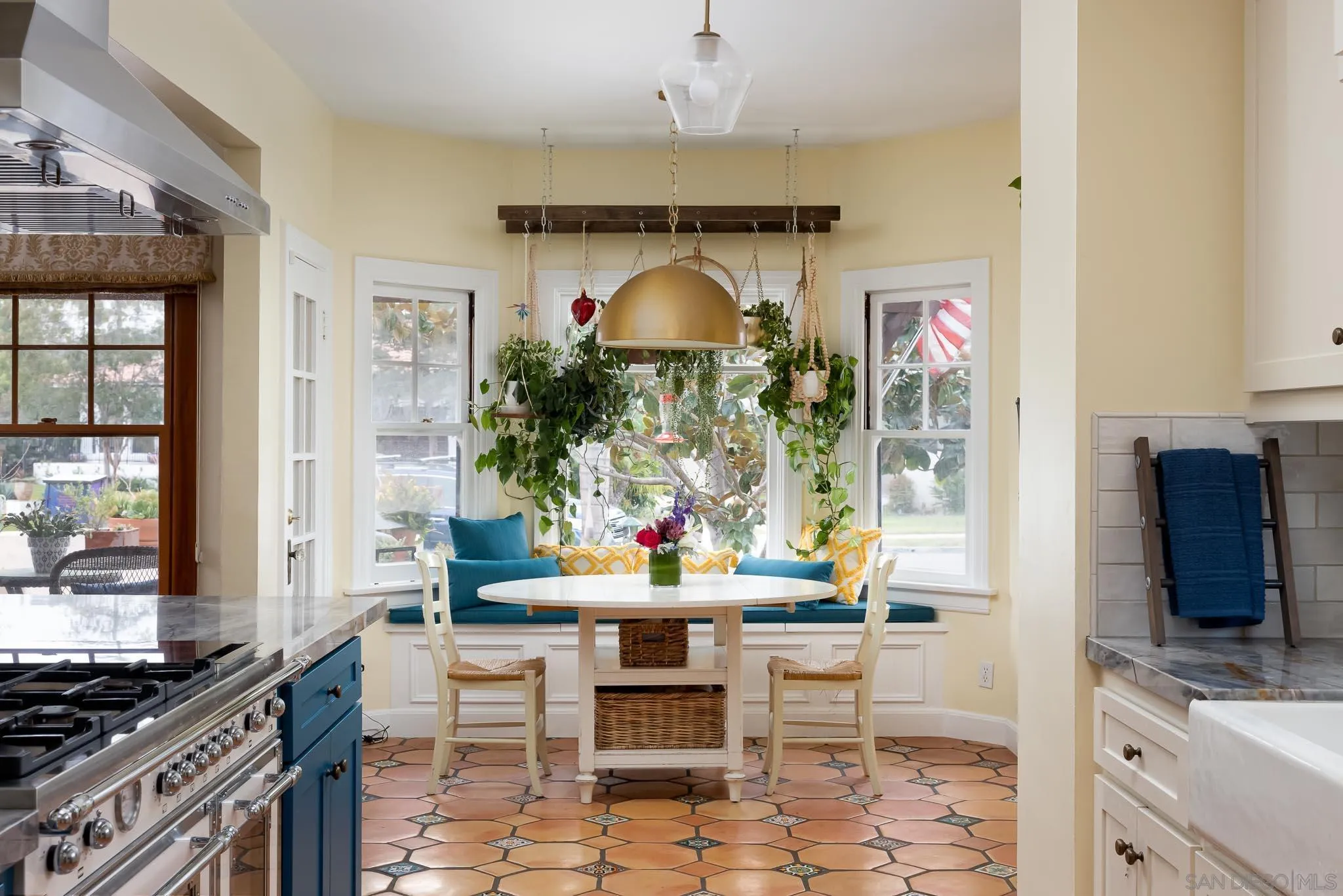 4192 Rochester Road San Diego, CA 92116 - Photo 10 of 49 a dining room with furniture and wooden floor