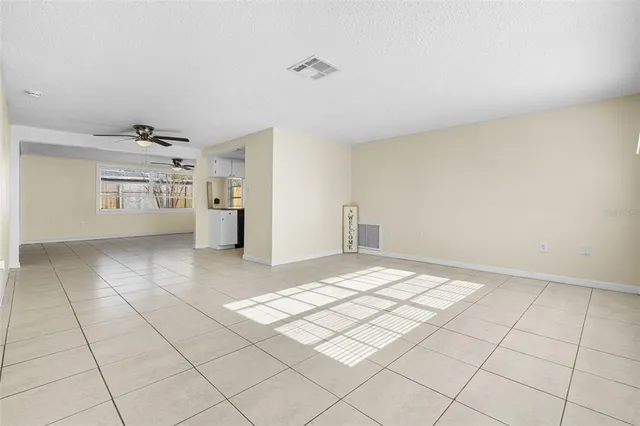 a view of an empty room and window