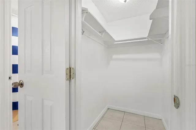 a view of a room with racks on the wall