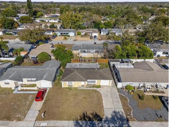 an aerial view of a city with lots of residential buildings
