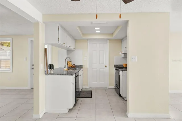 a view of a kitchen with a sink