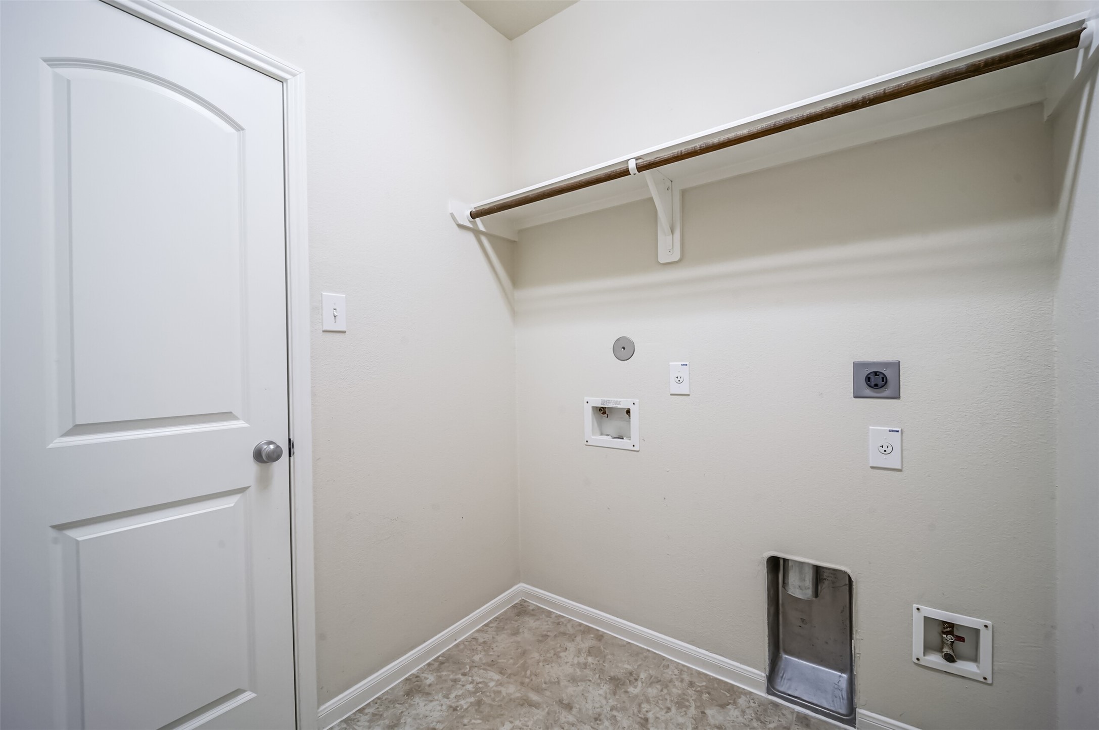 10003 Open Slope Court Humble, TX 77396 - Photo 19 of 25 Utility room with gas and electric connections.
