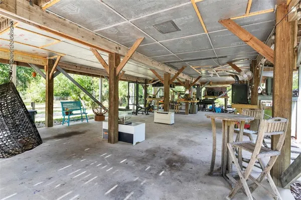 a view of a yard with a tree