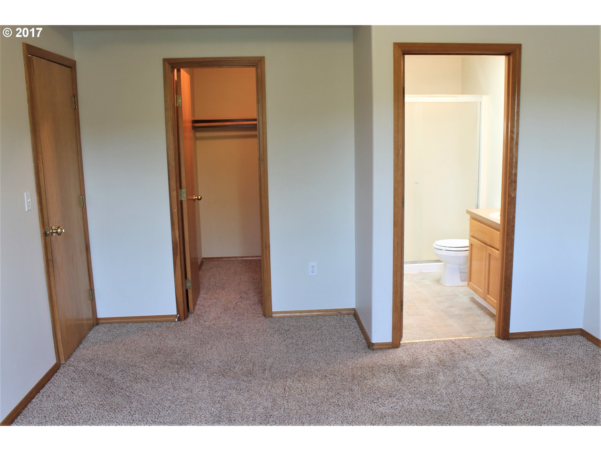 1026 Southwest Ivory Loop Gresham, OR 97080 - Photo 11 of 13 a view of a room that has a large window and closet