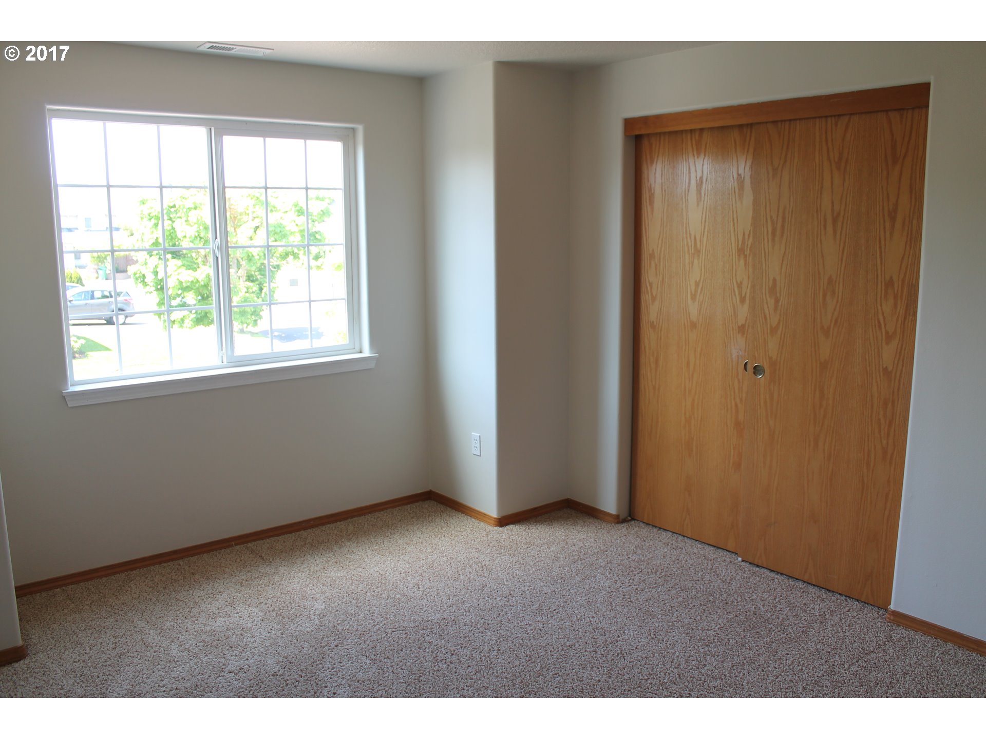 1026 Southwest Ivory Loop Gresham, OR 97080 - Photo 9 of 13 an empty room with windows