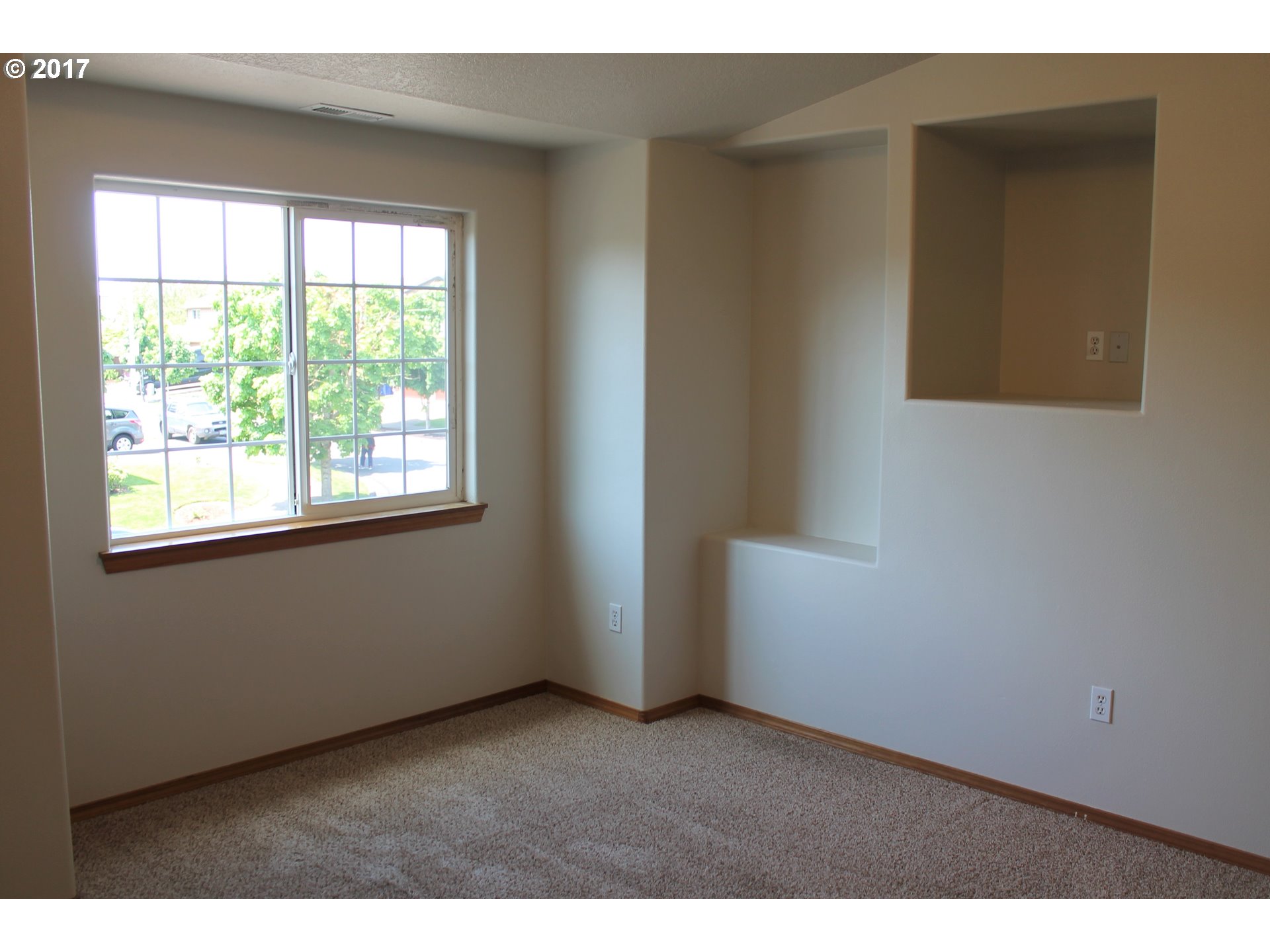 1026 Southwest Ivory Loop Gresham, OR 97080 - Photo 10 of 13 a view of an empty room with a window