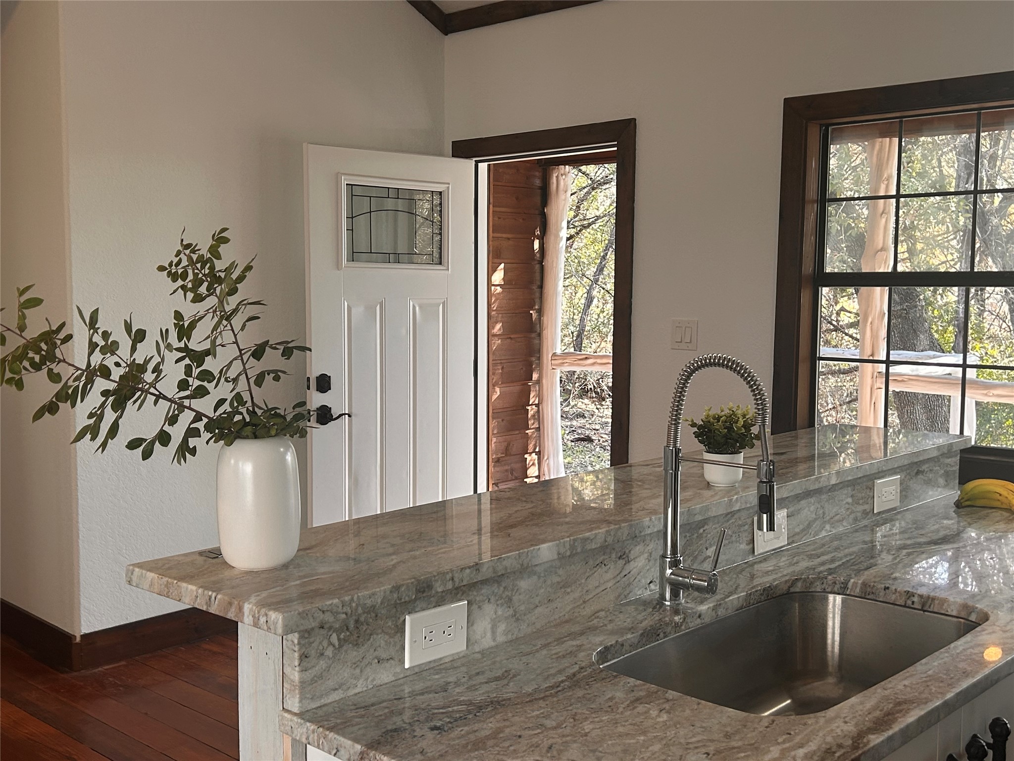 15104 Texas Street Austin, TX 78734 - Photo 6 of 18 a kitchen with a sink and a window