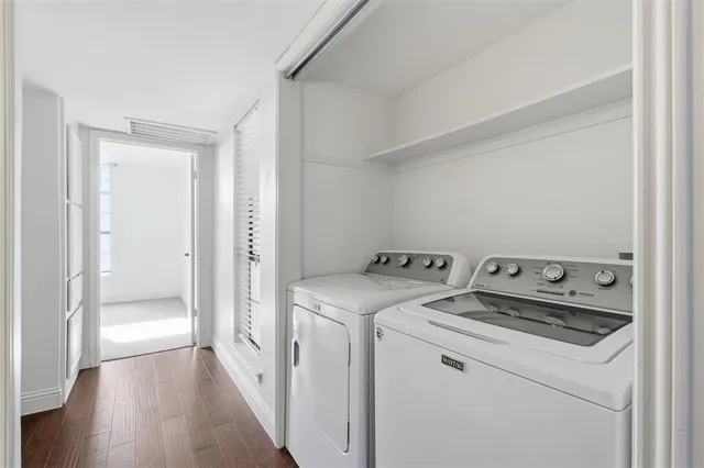 a utility room with dryer and washer