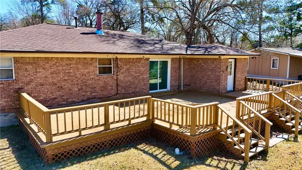 a view of a backyard of the house