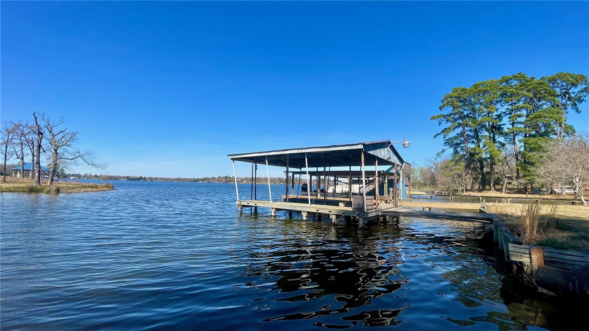 10933 Clyde Acord Road Franklin, TX 77856 - Photo 17 of 20 a view of a house with pool
