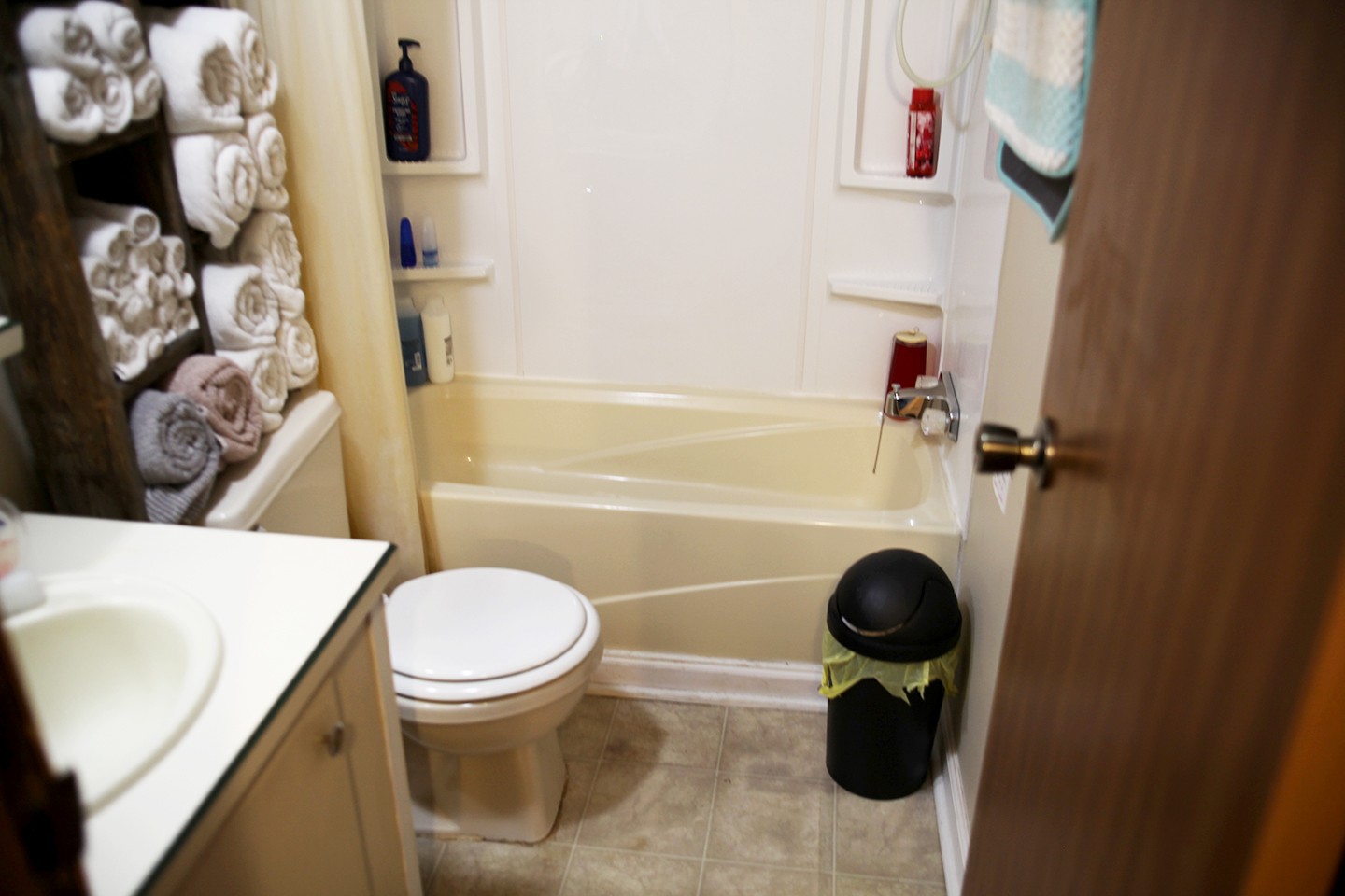 210 Maple Street Adams, TN 37010 - Photo 25 of 35 a bathroom with a toilet and a shower curtain