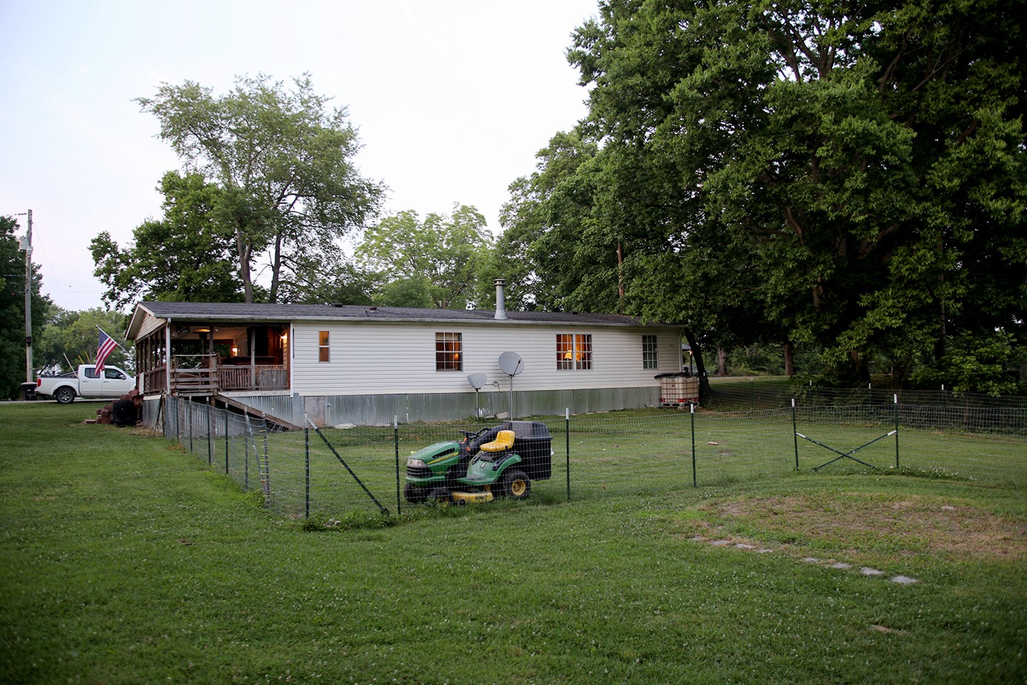 210 Maple Street Adams, TN 37010 - Photo 4 of 35 a view of backyard of house with table and chairs