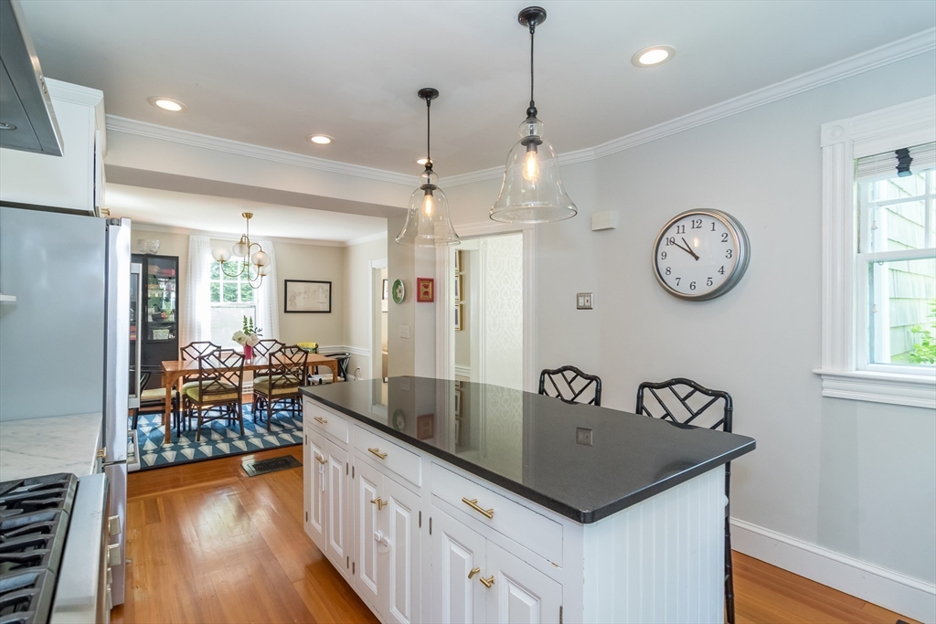 25 Glen Road Wellesley, MA 02481 - Photo 3 of 19 a view of a kitchen area with furniture and wooden floor