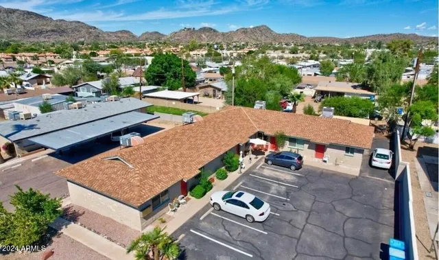 an aerial view of a house with a garden
