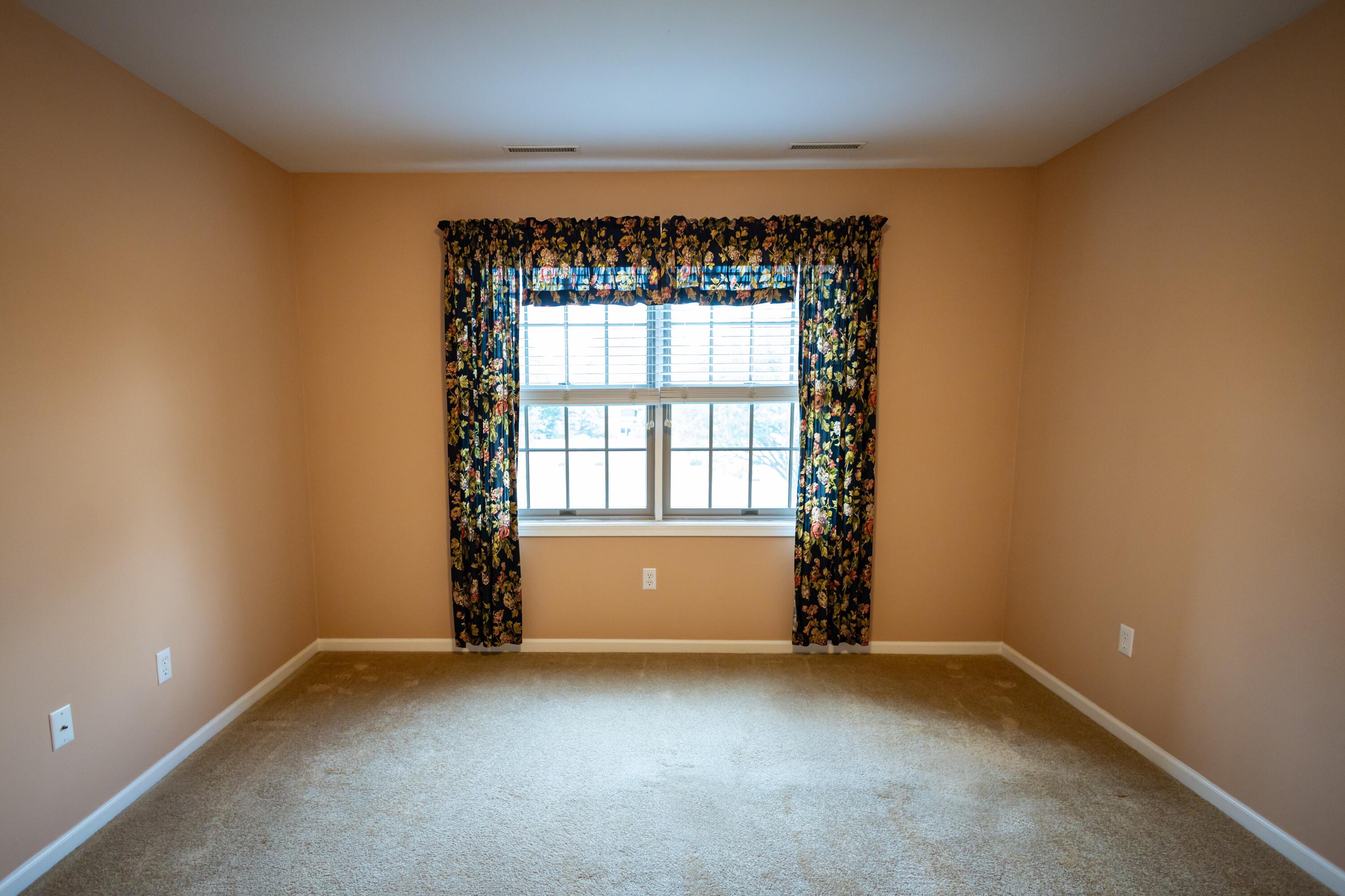 1608 White Oak Circle, Unit 2A Munster, IN 46321 - Photo 18 of 37 an empty room with a window