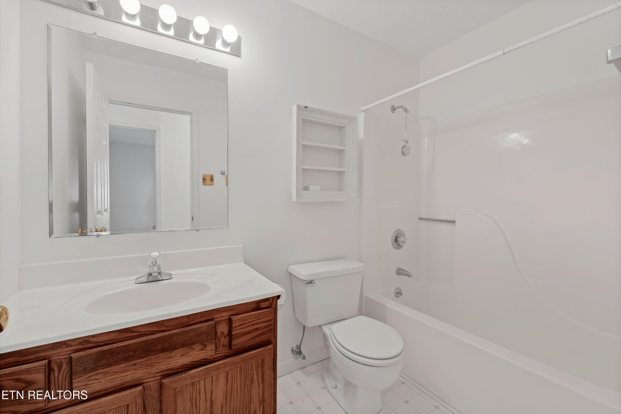2036 Little Best Road Maryville, TN 37803 - Photo 19 of 54 a bathroom with a sink a toilet and shower