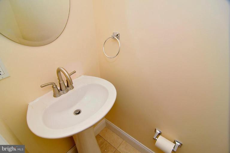 514 Park Road Northwest Washington, DC 20010 - Photo 15 of 15 a bathroom with a sink and mirror