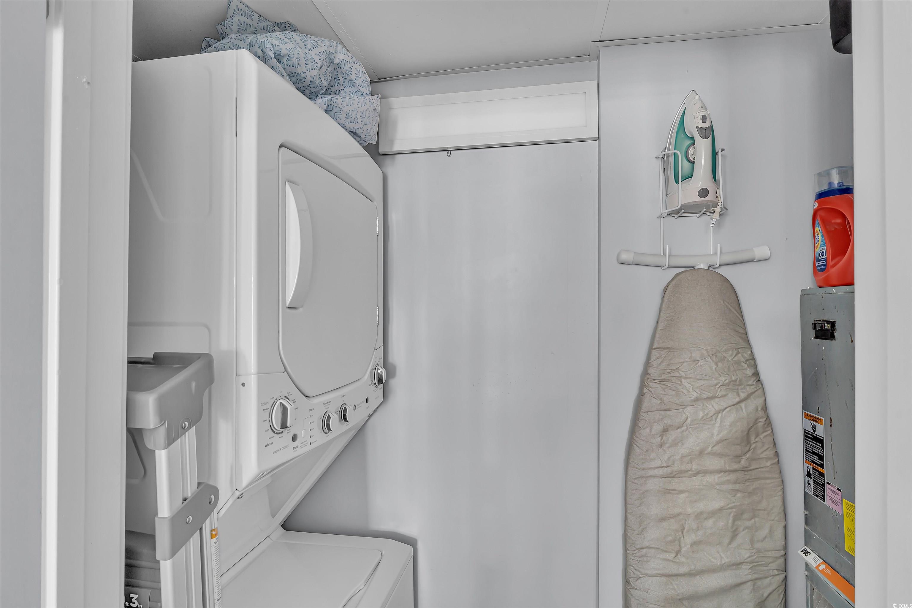 161 Seawatch Drive, Unit 1118 Myrtle Beach, SC 29572 - Photo 15 of 40 Laundry area featuring stacked washer / drying machine