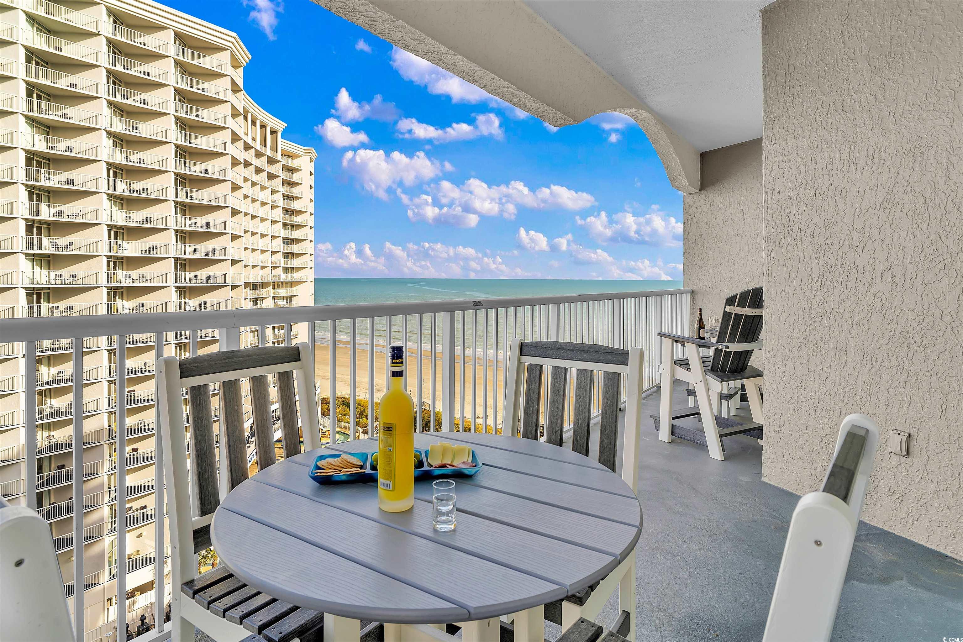 161 Seawatch Drive, Unit 1118 Myrtle Beach, SC 29572 - Photo 18 of 40 Balcony featuring view of water and beach