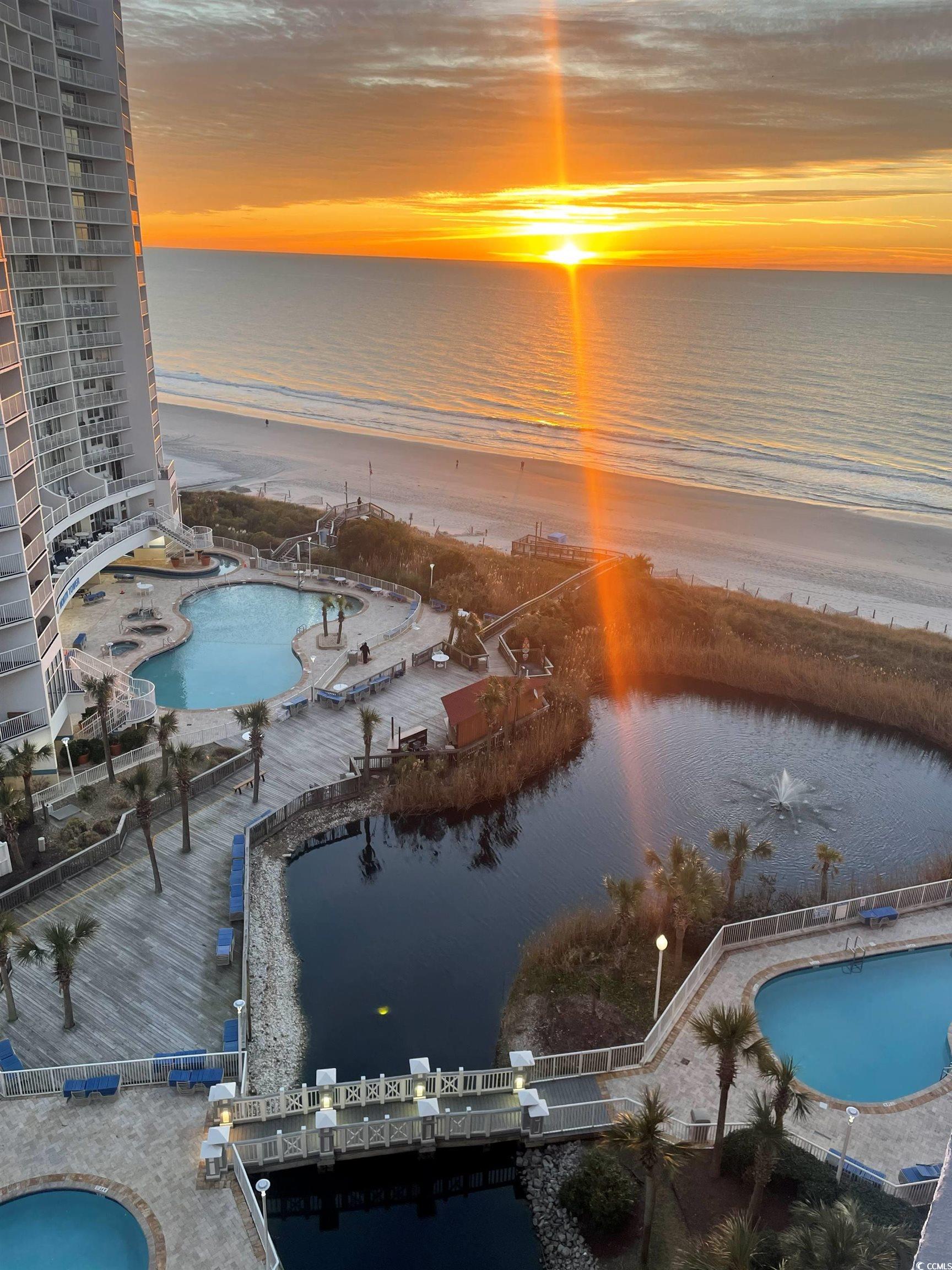 161 Seawatch Drive, Unit 1118 Myrtle Beach, SC 29572 - Photo 21 of 40 Community pool with a water view