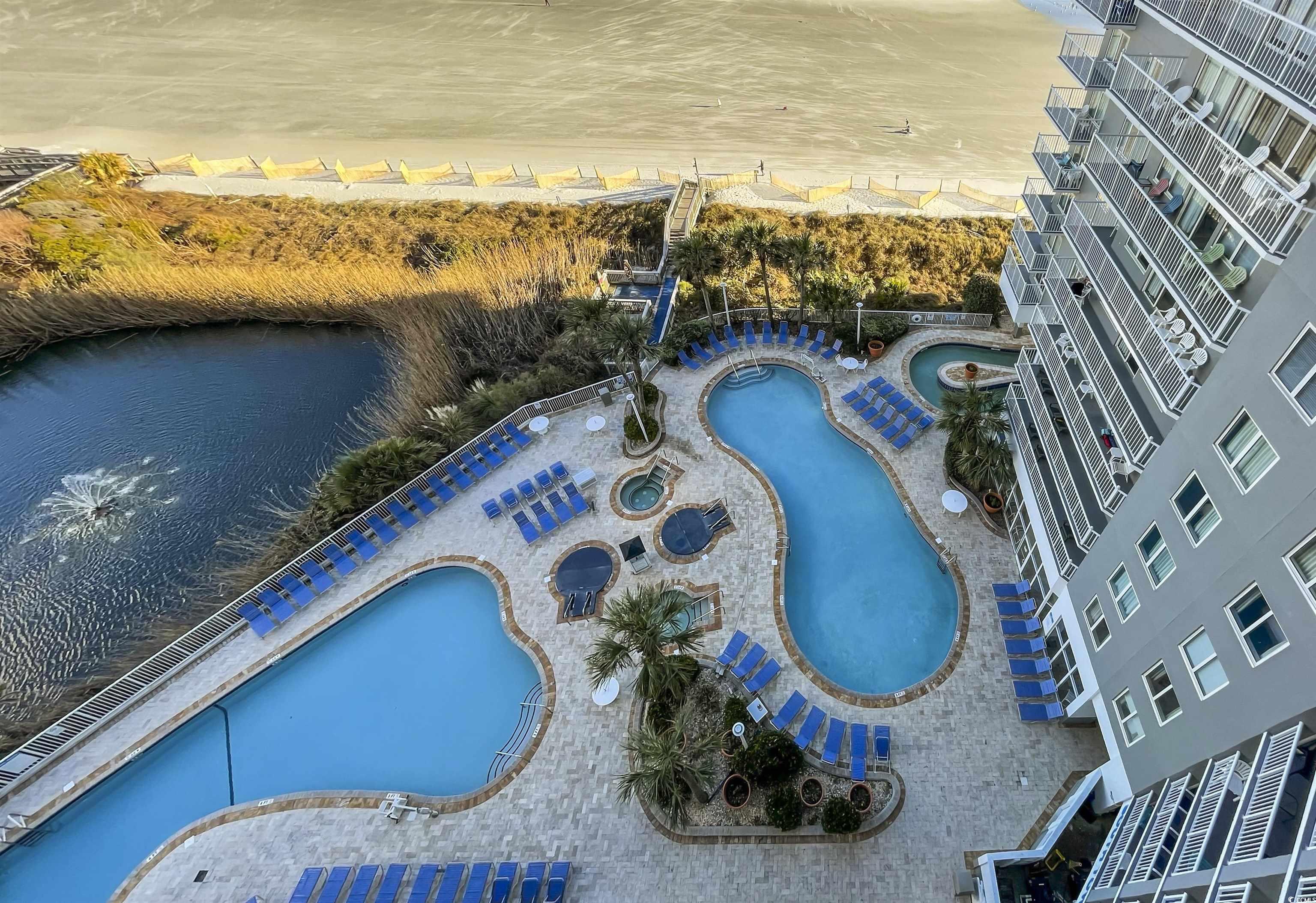 161 Seawatch Drive, Unit 1118 Myrtle Beach, SC 29572 - Photo 24 of 40 Drone / aerial view of a pool