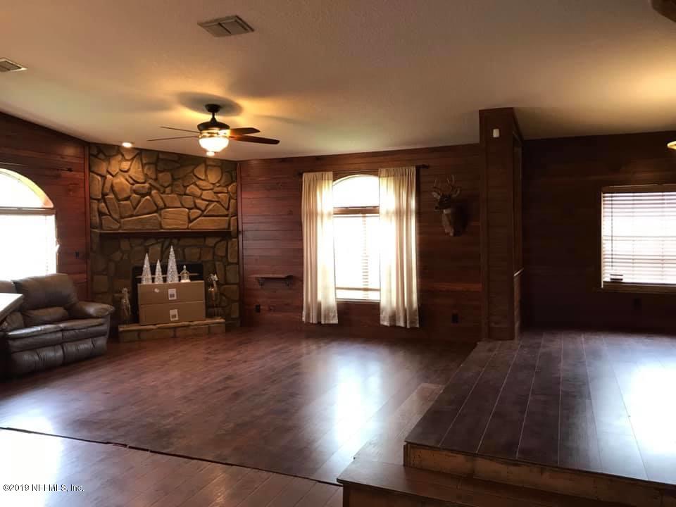 2865 Usina Road St. Augustine, FL 32084 - Photo 12 of 16 family room dining room from kitchen