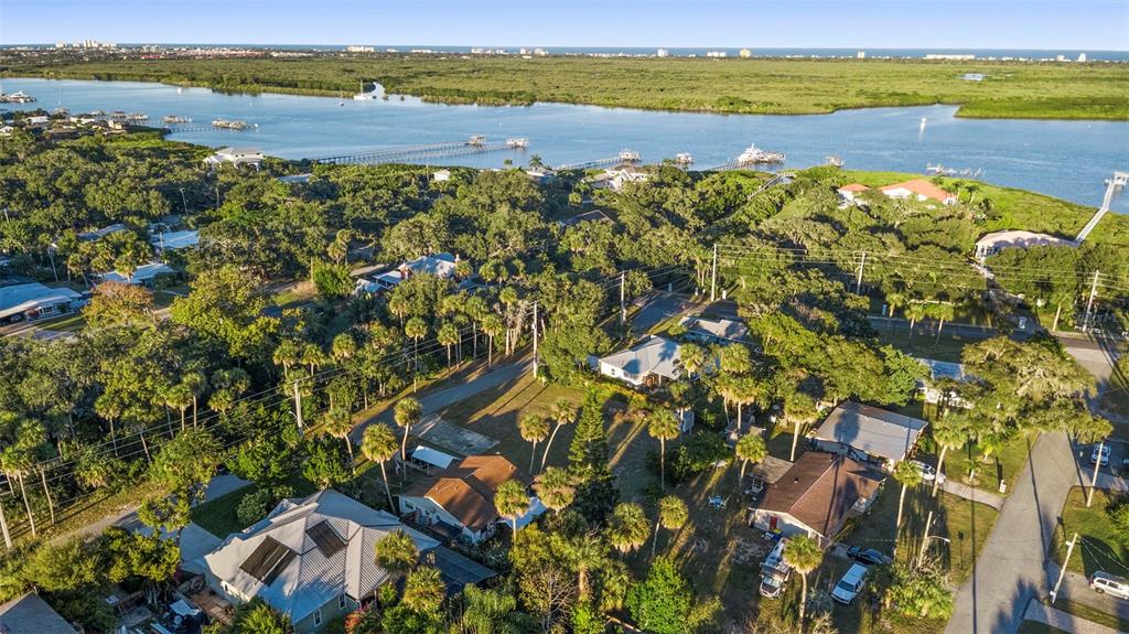 120 Hamilton Road Edgewater, FL 32132 - Photo 20 of 21 a view of a lake with a mountain