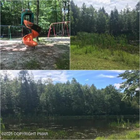 a view of a park with iron fence