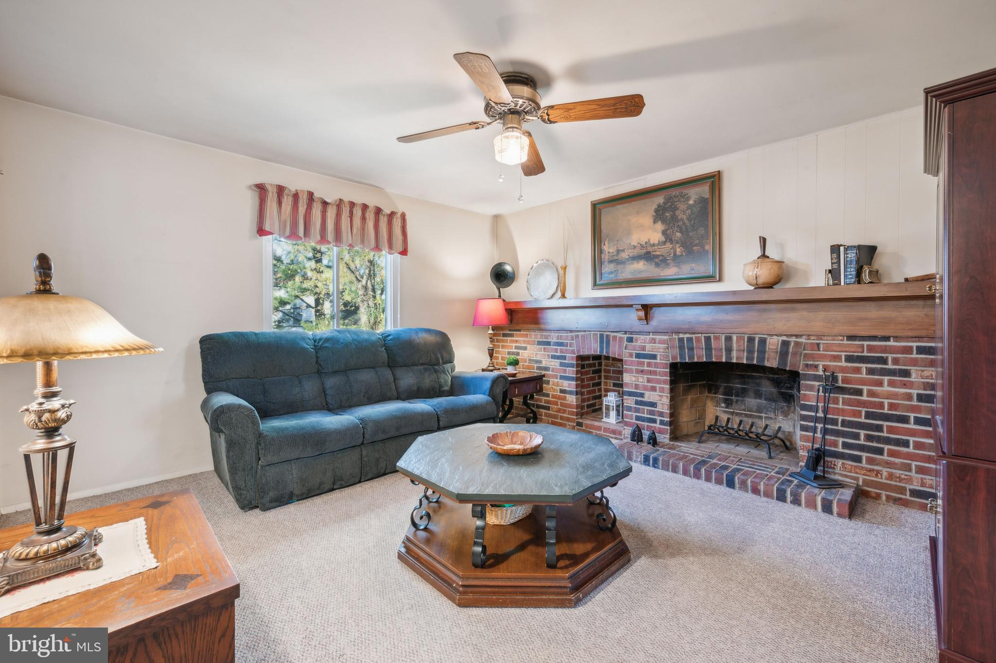 106 Pelham Road Delran, NJ 08075 - Photo 12 of 24 a living room with furniture and a fireplace