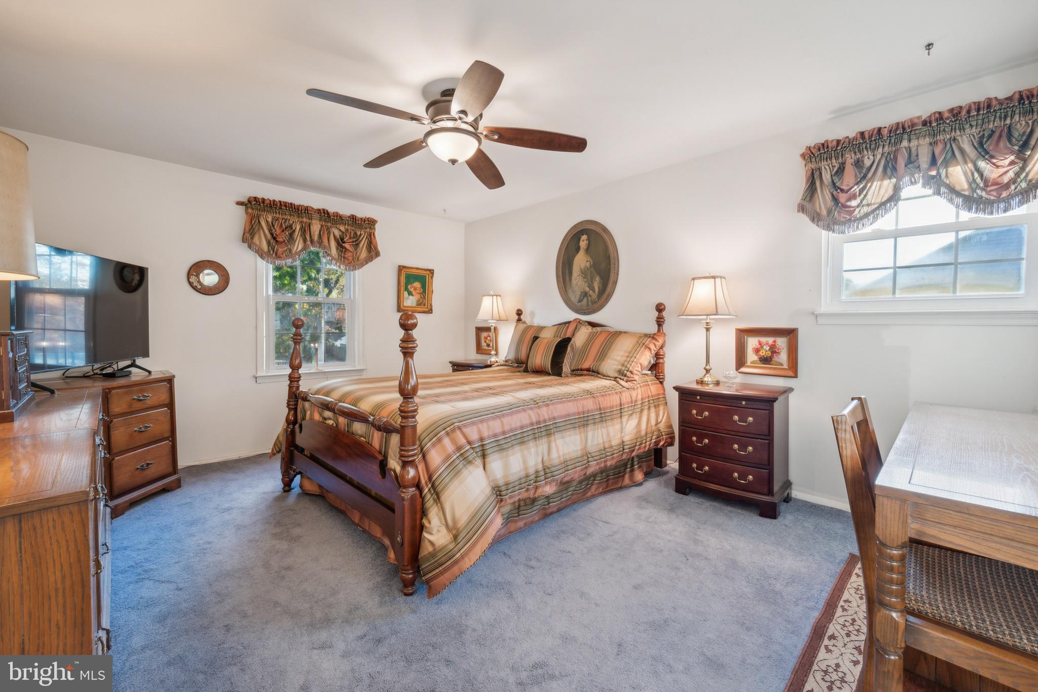 106 Pelham Road Delran, NJ 08075 - Photo 17 of 24 a bedroom with a bed and a chandelier
