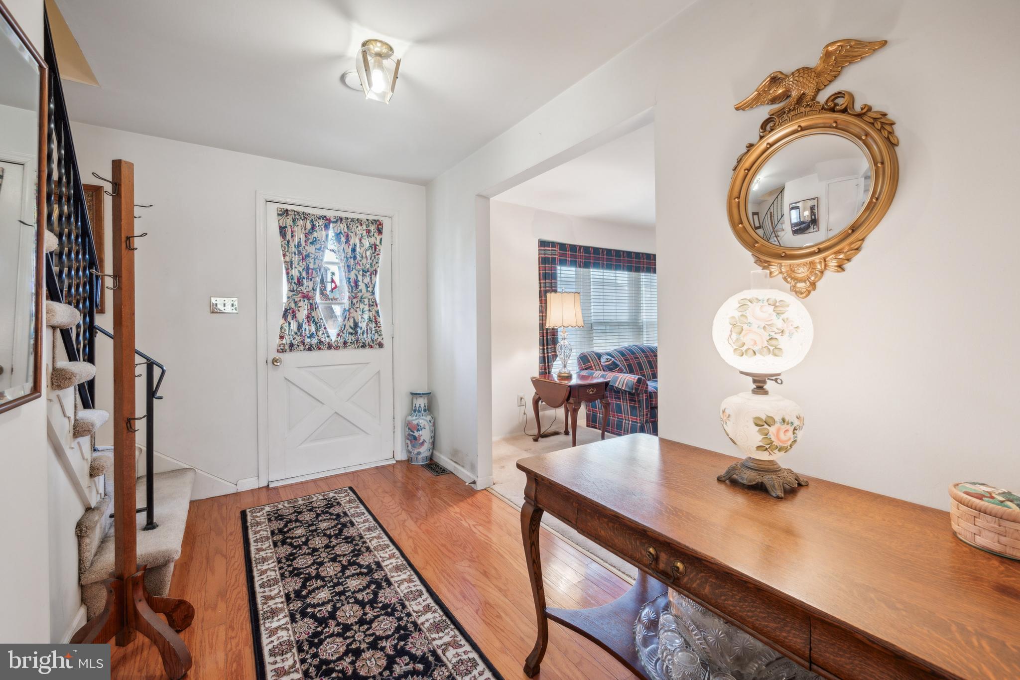 106 Pelham Road Delran, NJ 08075 - Photo 3 of 24 a bedroom with a bed and a chandelier