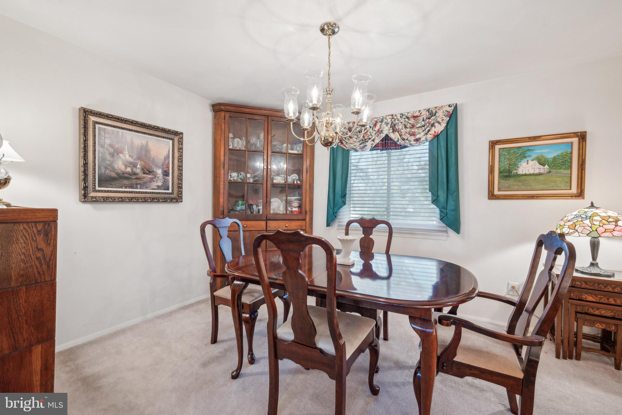 106 Pelham Road Delran, NJ 08075 - Photo 7 of 24 a dining room with furniture a chandelier and window